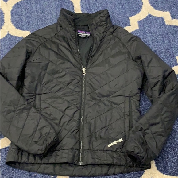 ripped patagonia jacket